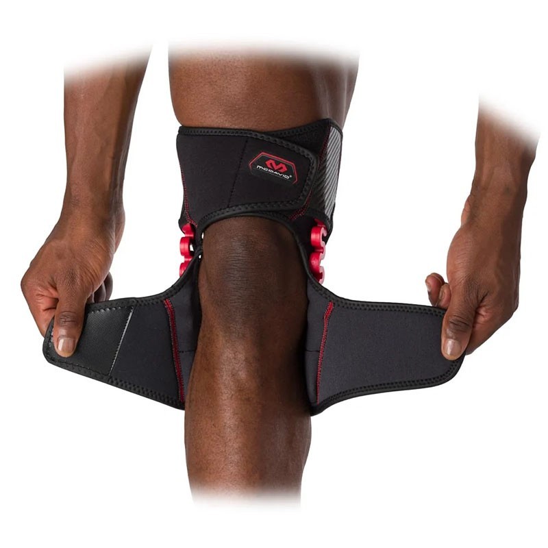30590 – Genouillère enveloppante avec charnières à ressort NRG - McDavid - Le Sport Discount pas cher